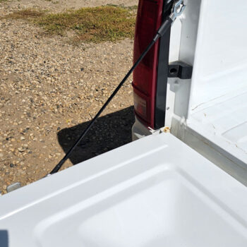 1982-1994-s10-tailgate-cables-chevy-truck-installed-white-truck-canada