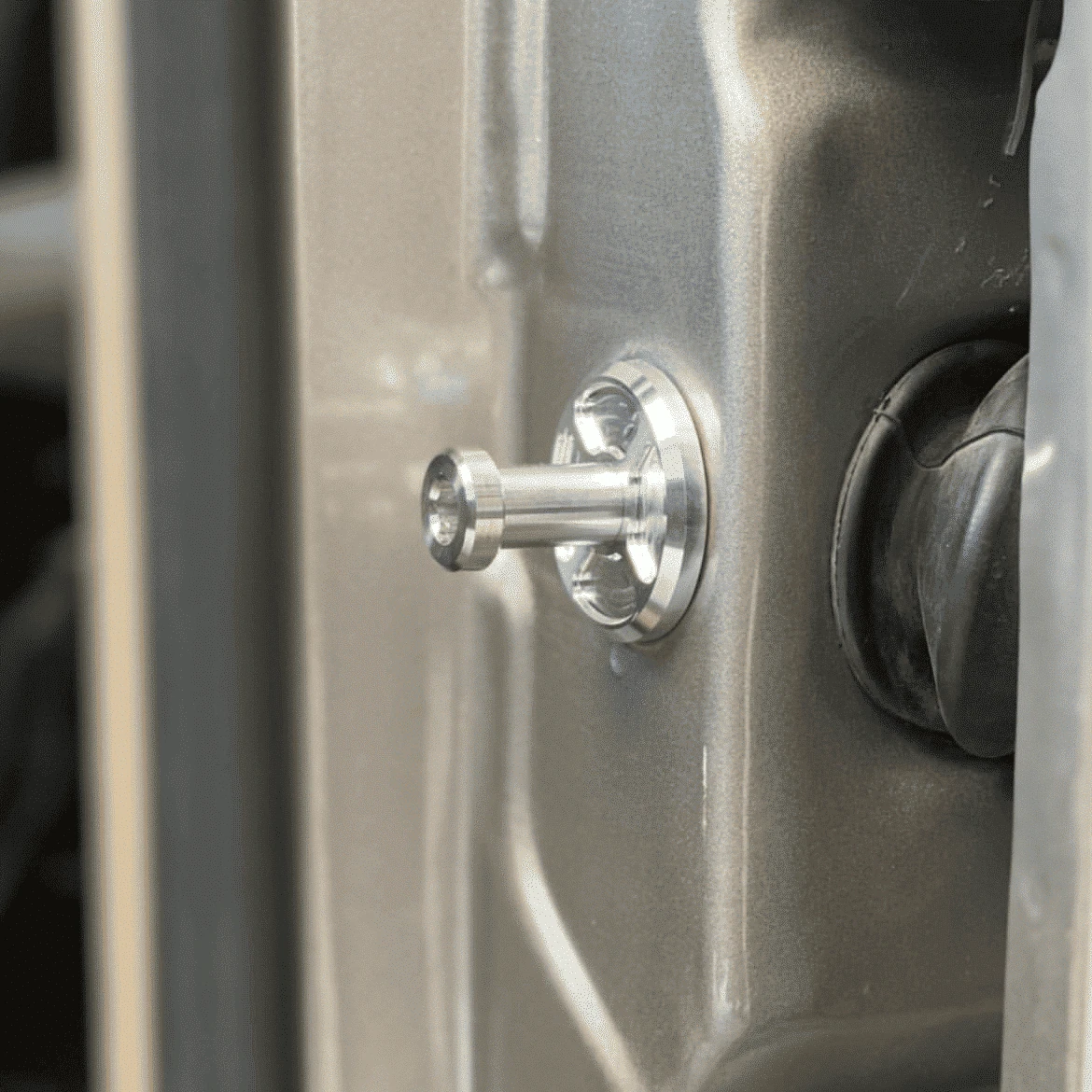Replacement billet door striker for 88-98 GMC Chevy OBS truck, close-up