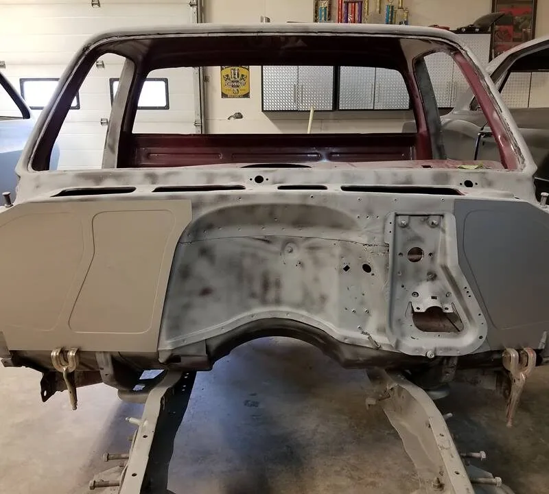 Squarebody C10 firewall panel in the engine bay of a 73-87 Chevy truck