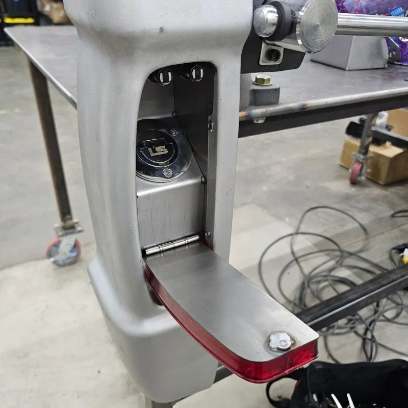 Ford taillight fuel filler bucket installed behind the taillight of a 1967-72 F100 bedside