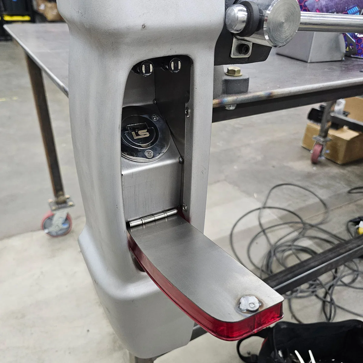 Ford taillight fuel filler bucket installed behind the taillight of a 1967-72 F100 bedside