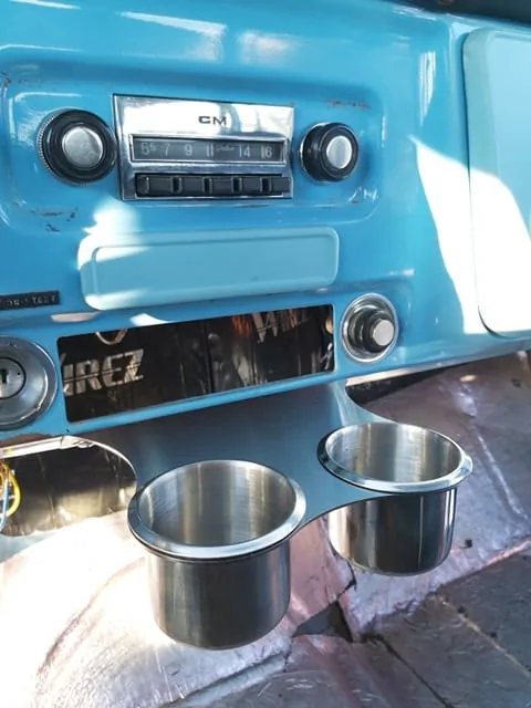 Stainless steel cup holder under the dash of a 67-72 GMC Chevy C10 truck