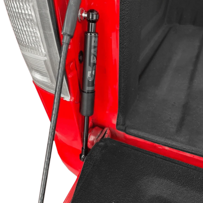 Tailgate saver shock shown installed on an 88-98 GMC Chevy OBS truck