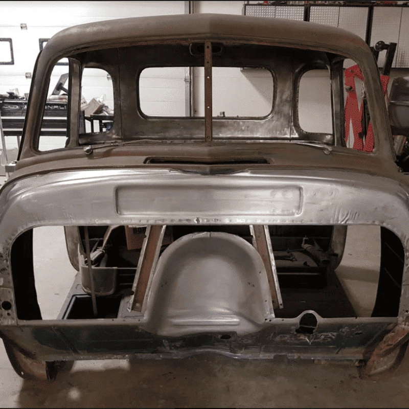 Factory firewall cutout prepared for a 47-54 Chevy truck bead rolled panel