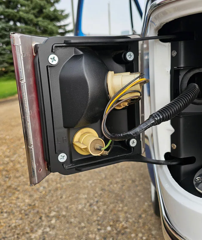 Inside chevy taillight fuel filler for squarebody trucks