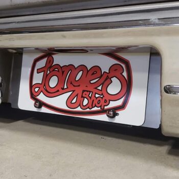 Raised license plate bracket installed on a 67-87 GMC Chevy sport bumper