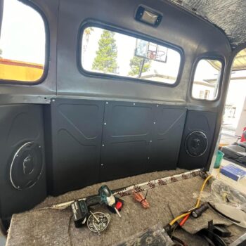 behind the seat panels and speaker brackets 47 54