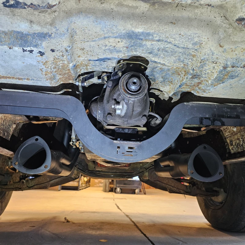 Transmission crossmember installed on a 63-87 Chevy truck, side view