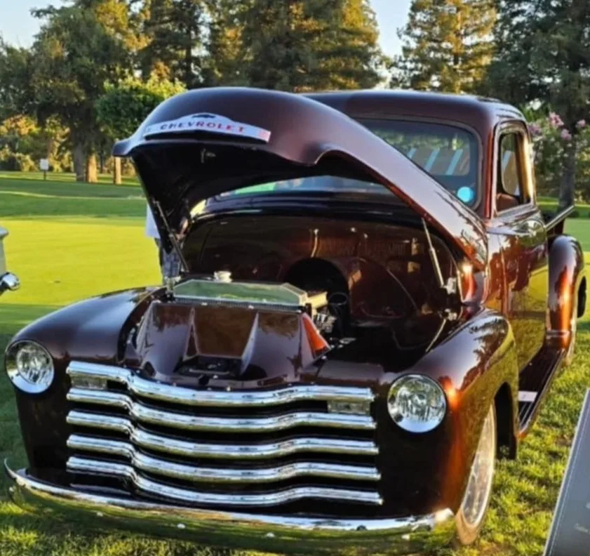 Hood strut for 47-54 GMC Chevy truck, close-up detail