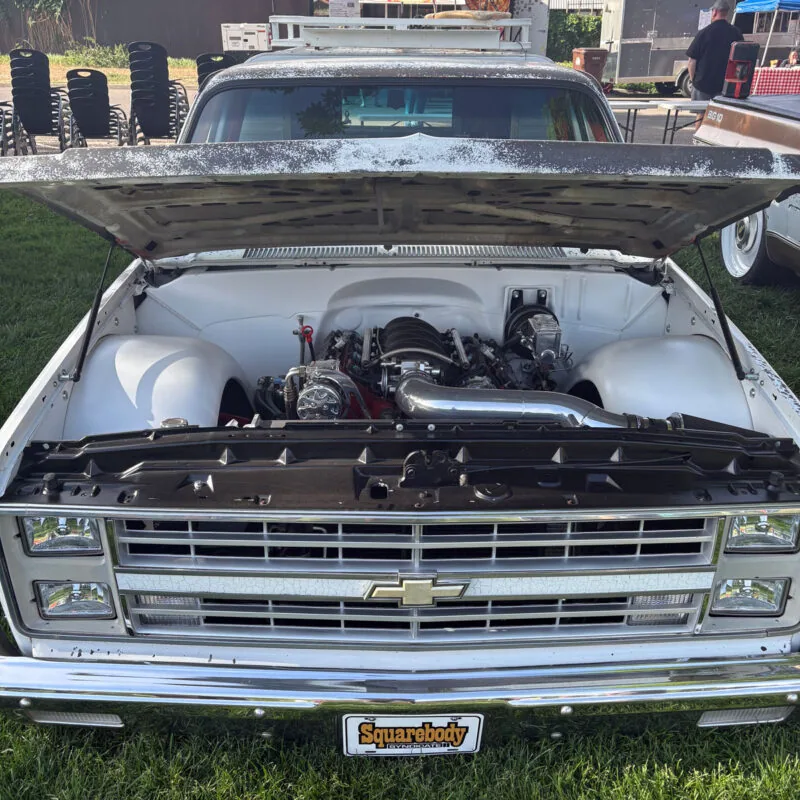 Hood strut kit for 73-87 Chevy squarebody truck, shown holding the hood open